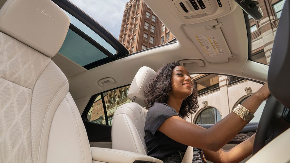 Person test driving a Buick